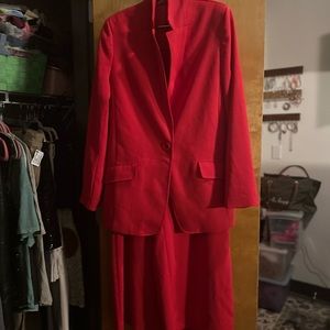 Selling this red suit that was worn for an event. Fits like a size 12. Worn 1x